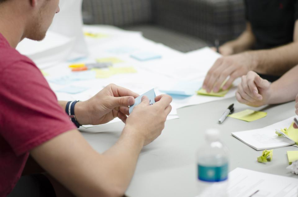 A working session reviewing supplier options and sourcing requirements